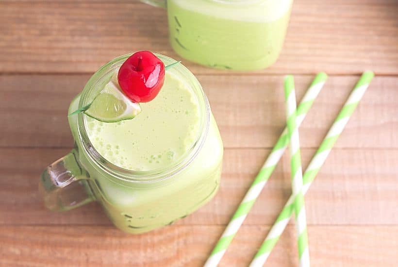 Cool off with a glass of this refreshing Frozen Limeade Punch. This is an easy frozen drink recipe that makes a great party punch too. This non-alcoholic drink recipe is the perfect mocktail for kids and adults. It is a big batch recipe so it is a perfect party drink. This limeade slushie recipe is a winner.