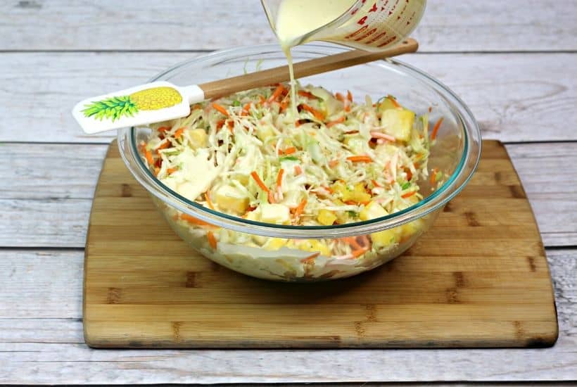 This Hawaiian Coleslaw recipe (or pineapple slaw) is zesty, crunchy and balanced with sweet pineapple flavor. This easy slaw recipe is a tasty twist on the classic coleslaw.