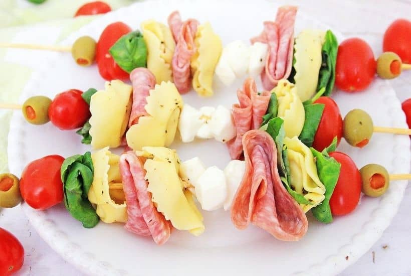 These make-ahead Tortellini Antipasto Skewers Appetizers are an easy and delicious party recipe or snack idea. This super easy antipasto recipe feeds a crowd too.