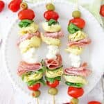These make-ahead Tortellini Antipasto Skewers Appetizers are an easy and delicious party recipe or snack idea. This super easy antipasto recipe feeds a crowd too.