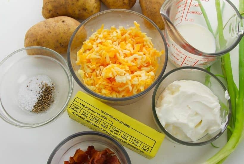 These Best Twice Baked Potatoes With Bacon are a cheesy, creamy and filled with lots of bacon. This easy potato recipe is perfectly portioned and can be made in advance.