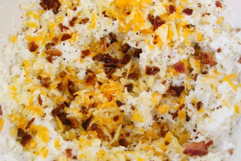 These Best Twice Baked Potatoes With Bacon are a cheesy, creamy and filled with lots of bacon. This easy potato recipe is perfectly portioned and can be made in advance.
