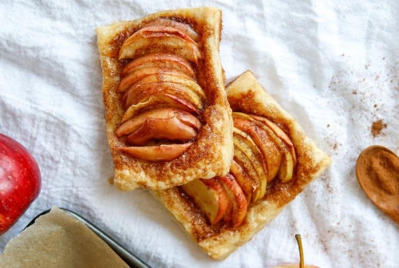 They may look fancy, but these easy puff pastry apple tarts are anything but! This easy rustic apple tarts recipe is so delicious. Fill these apple pastries with your favorite apple variety, cinnamon and sugar.
