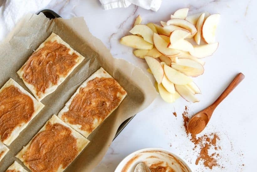 They may look fancy, but these easy puff pastry apple tarts are anything but! This easy rustic apple tarts recipe is so delicious. Fill these apple pastries with your favorite apple variety, cinnamon and sugar.