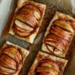 They may look fancy, but these easy puff pastry apple tarts are anything but! This easy rustic apple tarts recipe is so delicious. Fill these apple pastries with your favorite apple variety, cinnamon and sugar. This easy apple tart recipe is perfect for breakfast or a quick snack. You family will love this easy apple dessert recipe made with puff pastry.