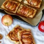 They may look fancy, but these easy puff pastry apple tarts are anything but! This easy rustic apple tarts recipe is so delicious. Fill these apple pastries with your favorite apple variety, cinnamon and sugar. This easy apple tart recipe is perfect for breakfast or a quick snack. You family will love this easy apple dessert recipe made with puff pastry.