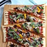 It's time to fire up the grill and turn a traditional pizza recipe into an easy and delicious Grilled Pizza. Here's How To Make the Perfect Grilled Pizza recipe.