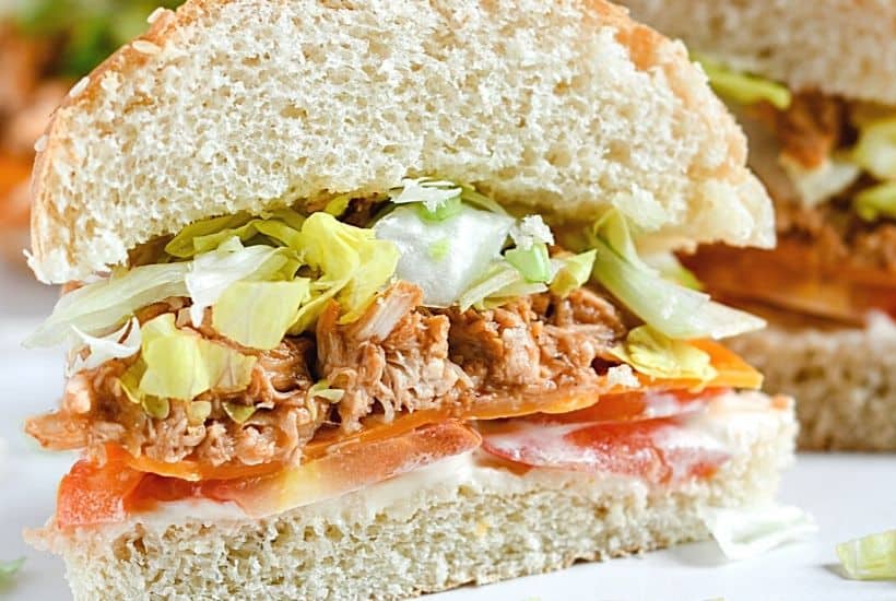 Looking for an easy weeknight meal? These Shredded BBQ Chicken Sandwiches are a delicious solution. Your family will love these barbecue chicken sandwiches. This easy sandwich recipe is great to serve at a party, football tailgate or game day celebration.