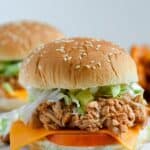 Looking for an easy weeknight meal? These Shredded BBQ Chicken Sandwiches are a delicious solution. Your family will love these barbecue chicken sandwiches. This easy sandwich recipe is great to serve at a party, football tailgate or game day celebration.