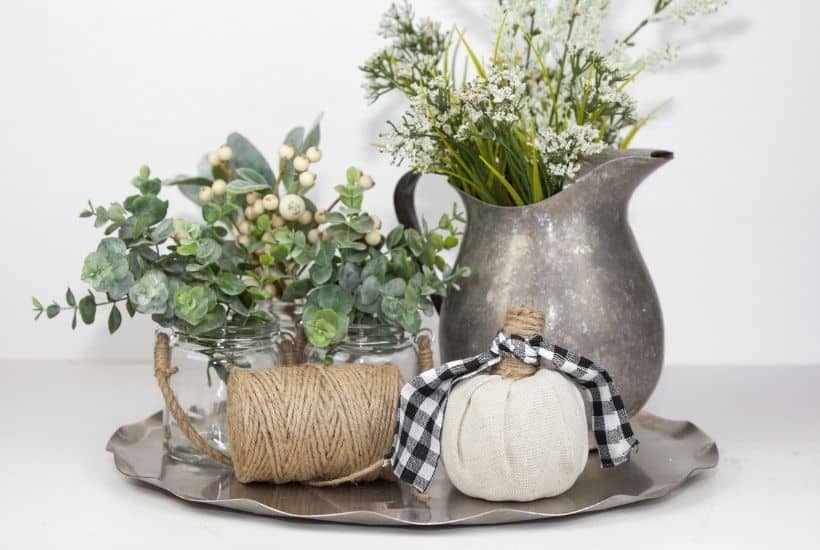 Create your own farmhouse style vibe this fall. These DIY Farmhouse Style Fabric Pumpkins are easy and so pretty to display. These farmhouse fabric pumpkins will be the perfect fall centerpiece for your farmhouse look.