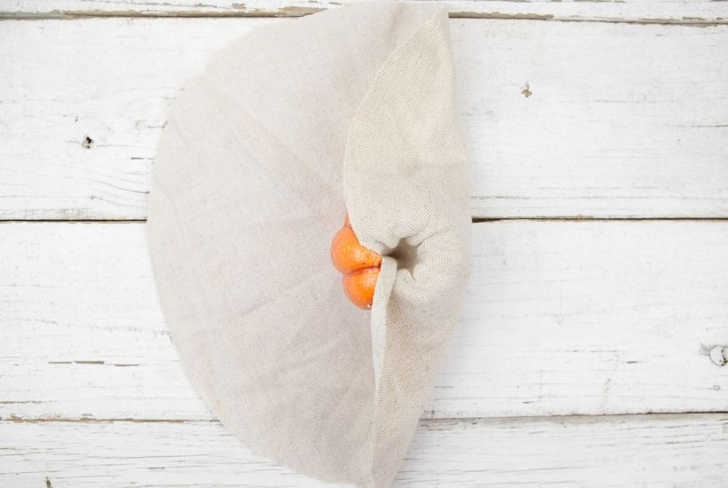 Create your own farmhouse style vibe this fall. These DIY Farmhouse Style Fabric Pumpkins are easy and so pretty to display. These farmhouse fabric pumpkins will be the perfect fall centerpiece for your farmhouse look.