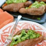 Enjoy a dairy-free and flavorful dish when preparing the Pesto Chicken Stuffed Sweet Potatoes. You can prepare this Whole 30 recipe in less than two hours. You will love how easy this sweet potato recipe is to make. This baked sweet potatoes recipe is so delicious.