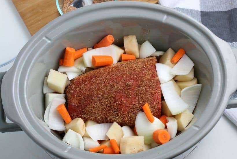 Bring the taste of comfort food home with this classic Crock Pot Beef Roast recipe. The hearty meal cooks at a steady pace in the slow cooker to provide a meal that will melt in your mouth. This easy slow cooker pot roast recipe is loaded with carrots, potatoes and onions. No need to turn the oven on with the easy Crock Pot Pot Roast recipe.