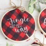 Homemade Christmas ornaments add a special touch to your tree. Add a farmhouse flair and make some Buffalo Plaid Hoop Ornaments. It's an easy Cricut Christmas craft.