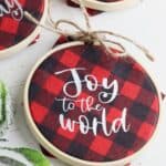 Homemade Christmas ornaments add a special touch to your tree. Add a farmhouse flair and make some Buffalo Plaid Hoop Ornaments. It's an easy Cricut Christmas craft.