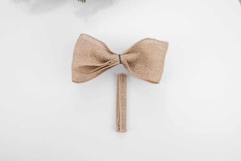 It's not a farmhouse Christmas without buffalo plaid and a vintage red truck. This Buffalo Plaid Christmas Hoop Wreath is an easy farmhouse Christmas craft.