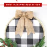 It's not a farmhouse Christmas without buffalo plaid and a vintage red truck. This Buffalo Plaid Christmas Hoop Wreath is an easy farmhouse Christmas craft. This DIY Christmas wreath is an easy Christmas craft. If you love farmhouse style design, this is a perfect Christmas project to make for your home.