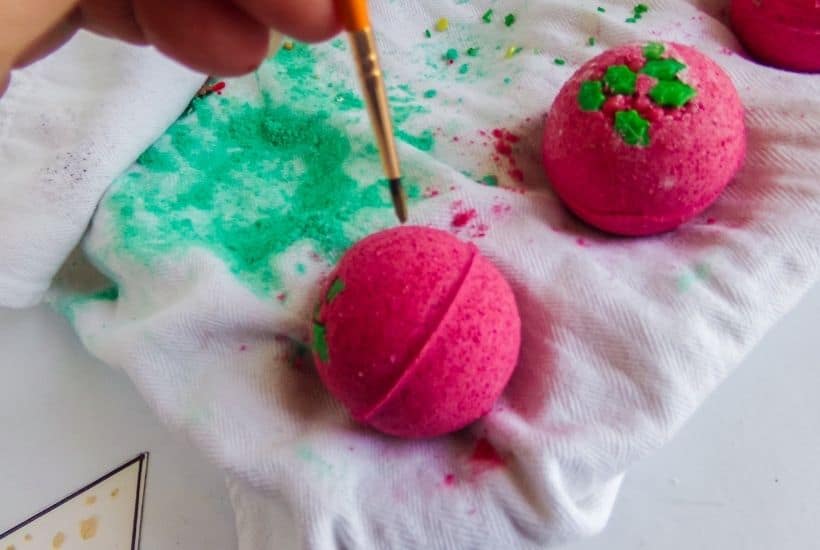 Give the gift of pampering this year. We all need it after this crazy year. These DIY Holly Bath Bombs are an easy DIY craft and perfect stocking stuffer idea.