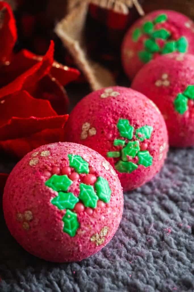 Give the gift of pampering this year. We all need it after this crazy year. These DIY Holly Bath Bombs are an easy DIY craft and perfect stocking stuffer idea.
