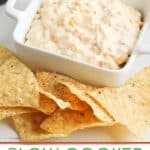 This Cheesy Slow Cooker Fiesta Corn Dip is a creamy, cheesy dip recipe that's perfect for any party. It's great for tailgating, too!