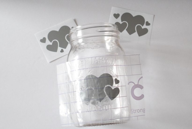 Grab some chalk paint and transform a mason jar into these Painted Mason Jar Valentine Lantern. This is an easy DIY Valentine's Day craft. Easy cricut craft project.