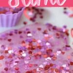You and your kids will LOVE making this easy DIY Valentine's Day Slime project. This easy Valentine's Day Craft is a lot of ooey-gooey fun. This kids craft makes a great party favor too! Learn how to make this easy slime recipe for kids. #Slime #ValentinesDay #Crafts #DIY #Kids #KidsCrafts #PartyIdeas