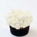 These Disney Cupcakes are inspired by the upcoming Disney movie Cruella. Make a batch of these Cruella de Vil cupcakes and celebrate the wickedness. This easy cupcake recipe is perfect for Disney fans. I love making Disney recipes at home. This Disney cupcake recipe is easy to make and easy to decorate. Celebrate your inner Disney Villain and whip up a batch of these Cruella cupcakes. These cupcakes are perfect for a 101 Dalmatians Party.