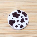 These Disney Cupcakes are inspired by the upcoming Disney movie Cruella. Make a batch of these Cruella de Vil cupcakes and celebrate the wickedness. This easy cupcake recipe is perfect for Disney fans. I love making Disney recipes at home. This Disney cupcake recipe is easy to make and easy to decorate. Celebrate your inner Disney Villain and whip up a batch of these Cruella cupcakes. These cupcakes are perfect for a 101 Dalmatians Party.