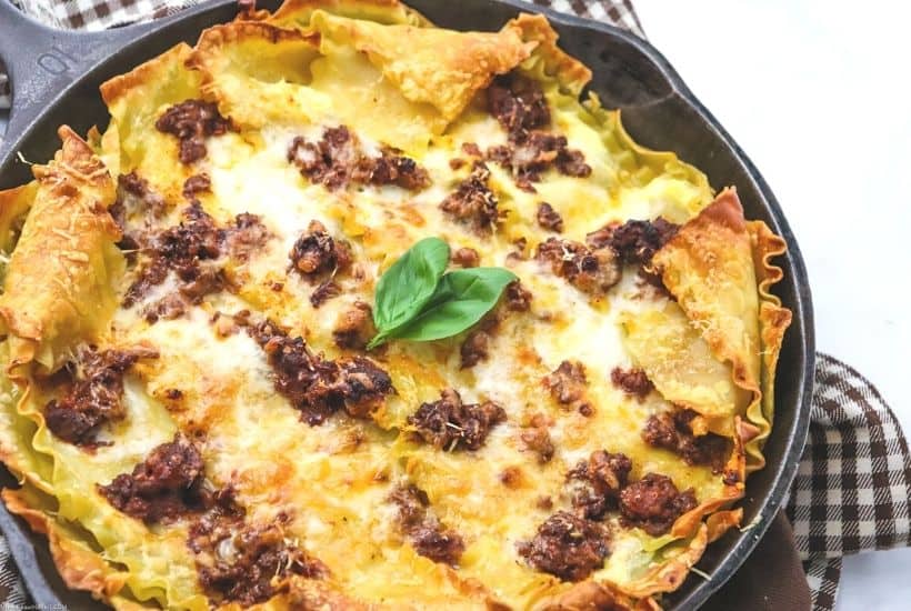Cast Iron Skillet Lasagna is an easy twist on the classic Italian recipe. This Cast Iron Lasagna makes a great weeknight meal idea. Grab your skillet and get cooking!