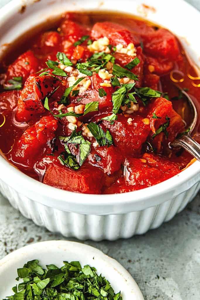 Need a quick appetizer recipe? Try this easy Burrata And Fire Roasted Tomato Bruschetta for your next party or gathering. Your guest will love this easy bruschetta recipe.