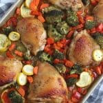 Want to make a delicious mess-free meal that is good for you? Try this health Sheet Pan Chicken and Vegetables Dinner consisting of chicken thighs, broccoli, carrots, and more! You will love this easy weeknight meal idea.