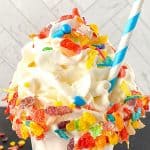 This is a milkshake recipe you don't want to pass up. This amazing Fruity Pebbles milkshake is Perfect blender Fruity Pebbles cereal vanilla ice cream milkshake for kids party food, Summer drink, or an easy dessert recipe. This creamy milkshake with Fruity Pebbles will definitely please any crowd. Check out the best vanilla Fruity Pebbles ice cream milkshake today.