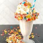 This is a milkshake recipe you don't want to pass up. This amazing Fruity Pebbles milkshake is Perfect blender Fruity Pebbles cereal vanilla ice cream milkshake for kids party food, Summer drink, or an easy dessert recipe. This creamy milkshake with Fruity Pebbles will definitely please any crowd. Check out the best vanilla Fruity Pebbles ice cream milkshake today.