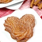 If you enjoy the sweet cinnamon taste of churros, learn how to make the cutest one you’ve ever seen. These Mickey Mouse Churros taste great and have an adorable appearance, making them a kid-friendly treat.