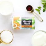 Orange Julius Popsicles are creamy, smooth, and full of orange flavor. If you love an orange creamsicle, you are going to love this variation of the classic frozen treat. This Copycat Orange Julius Pops Recipe is perfect for a hot summer day. Try this homemade orange creamsicle recipe today.