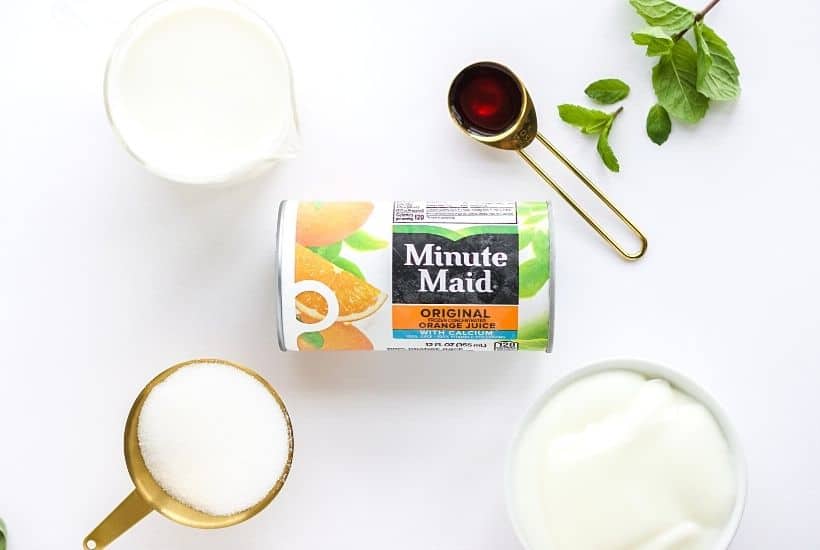 Orange Julius Popsicles are creamy, smooth, and full of orange flavor. If you love an orange creamsicle, you are going to love this variation of the classic frozen treat. This Copycat Orange Julius Pops Recipe is perfect for a hot summer day. Try this homemade orange creamsicle recipe today.