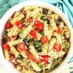 Easy Pepperoni Pasta Salad is a cold pasta salad recipe filled with pepperoni, cheese, vegetables and homemade Italian dressing. This zesty pepperoni pasta salad is perfect for potlucks, summer BBQs and large crowds!