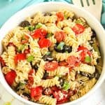 Easy Pepperoni Pasta Salad is a cold pasta salad recipe filled with pepperoni, cheese, vegetables and homemade Italian dressing. This zesty pepperoni pasta salad is perfect for potlucks, summer BBQs and large crowds!