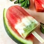 Stay hydrated and cool on a hot day with these flavorful Watermelon Pops. Made with fresh ingredients in a blender, these popsicles are delicious and naturally good for you. Watermelon Popsicles are a fresh frozen treat containing watermelon, kiwi, yogurt, and a few other ingredients. These pops get placed in the freezer until they’re cold and are perfect for consuming on a hot day.