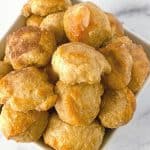 A simple recipe for a bread-making beginner, Cinnamon Sugar Pretzel Bites are a tasty treat made from scratch that will satisfy a sweet tooth. You can dip the warm homemade pretzel bites in your favorite dipping sauce - think caramel syrup or chocolate sauce. This easy homemade pretzel recipe makes a great afterschool snack idea for kids too. This is a copycat version of the famous Auntie Anne's Cinnamon Sugar Pretzels