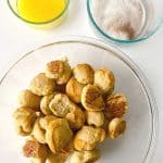 A simple recipe for a bread-making beginner, Cinnamon Sugar Pretzel Bites are a tasty treat made from scratch that will satisfy a sweet tooth. You can dip the warm homemade pretzel bites in your favorite dipping sauce - think caramel syrup or chocolate sauce. This easy homemade pretzel recipe makes a great afterschool snack idea for kids too. This is a copycat version of the famous Auntie Anne's Cinnamon Sugar Pretzels