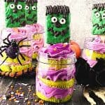 Cute and spooky, these easy Frankenstein Cupcakes In A Jar are perfect for a Halloween party. This kid-friendly Halloween recipe is made from doctored-up box cake mix and topped with a Frankenstein Rice Krispies treat.