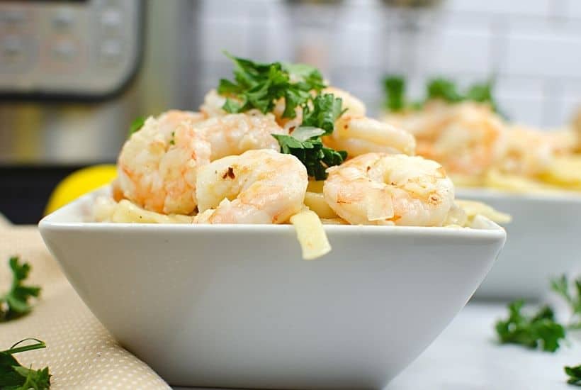 Prepare the perfect dinner with ease using this Instant Pot Shrimp Scampi recipe. Serve it over fettuccine noodles and a side salad to complete the meal. This easy instant pot recipe is a perfect weeknight meal idea. Try this easy Italian recipe.