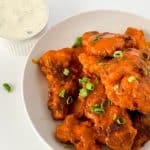 Ditch the restaurant and enjoy delicious Buffalo Chicken Tenders at home. These are the perfect appetizer or main course to serve with simple sides, like fries or tater tots. Homemade Ranch Dressing makes the perfect dipping sauce too. Add this easy chicken recipe to your weekly meal plan.