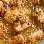 Easy homemade buffalo chicken tenders with ranch dipping sauce.