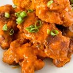 Easy homemade buffalo chicken tenders with ranch dipping sauce.