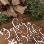 Make a decorative piece to hang in your home with this easy winter craft idea. Make a DIY Farmhouse Winter Sign that will add a special touch to any room in the home. This Christmas Cricut craft is a great project to make. It can be left up long after Christmas is over. Be sure to download the FREE SVG file - Baby It's Cold Outside too. Hang this sign on your entryway door or on a wall in your home.