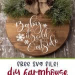 Make a decorative piece to hang in your home with this easy winter craft idea. Make a DIY Farmhouse Winter Sign that will add a special touch to any room in the home. This Christmas Cricut craft is a great project to make. It can be left up long after Christmas is over. Be sure to download the FREE SVG file - Baby It's Cold Outside too. Hang this sign on your entryway door or on a wall in your home.