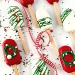 Get in the Christmas spirit with this fun and flavorful Holly Jolly Cakesicle recipe. Not only do these cake pop treats look good and make the perfect treat for guests, but they’re also absolutely delicious!
