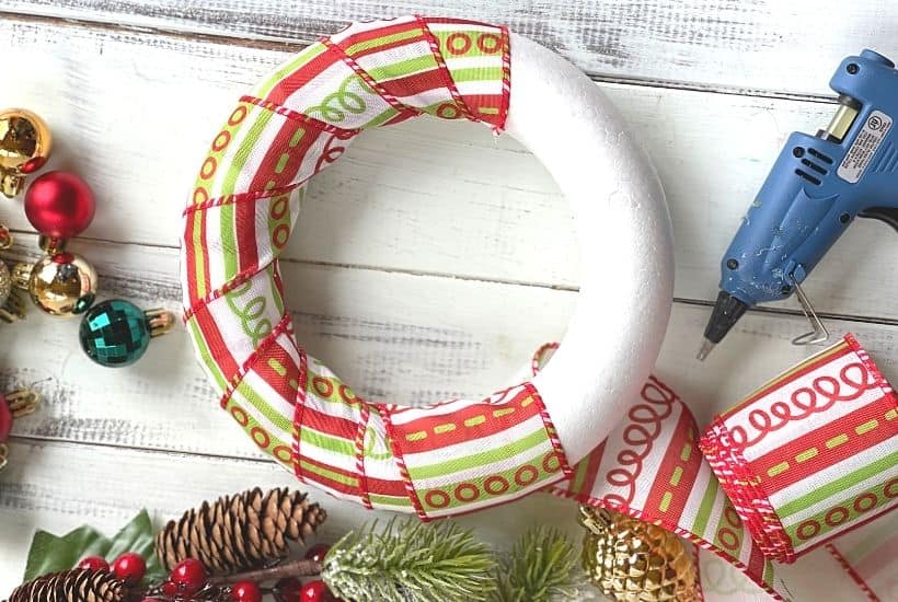 Deck the halls this holiday season with this DIY @NewJerseyLottery Christmas wreath. #Ad This unique ornament wreath is a great gift idea for friends and family too. What a perfect way to share some luck this holiday season. Hop on over to the blog and learn how to make this easy DIY holiday craft with New Jersey Lottery Holiday Scratch Offs. #AnythingCanHappenInJersey